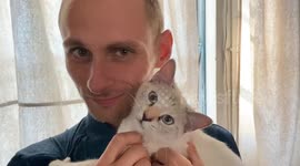 My son and his first cat, being real cute together.