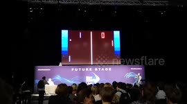 The people behind Wifi Wars invite an entire audience to play a game of Pong. using technology that randomly assigns audience members to each team to then allow everyone in that team to have an influence on the bat.