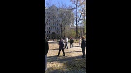 Kyiv residents leave their shelters to survey damage on the streets after Russian strikes