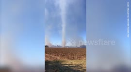 Tornado-like vortex rises from the ashes of field fire in Kentucky