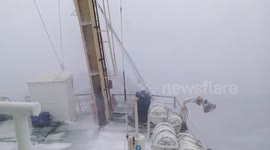 Russian fishing vessel battles through monstrous waves