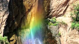 Radiant rainbow appears as sun shines on waterfall in northern China