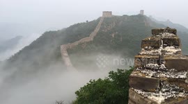 The Jinshanling Great Wall Shrouded In Mist After Rain In China