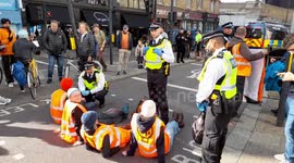 Just Stop Oil protesters arrested in Shoreditch, London, after blocking busy junction