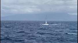 Yacht tackling rough seas between the islands of Paros and Naxos, Greece