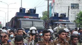 Scuffles erupt between students and police during anti-government protest in Colombo