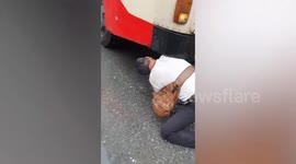 Bus forced to park after python hides inside its engine compartment in Thailand