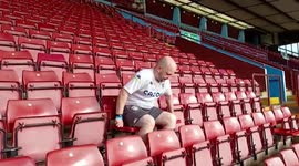 Man spends 35 hours sitting on all 42,785 seats at football stadium to raise money for charity