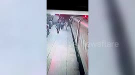 Passenger slips while forcefully trying to board moving train in northern India, rescued