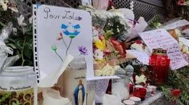 Flowers laid as tribute to murdered 12 year-old girl outside her home and school in Paris