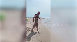 Chicago man spends three years and more than 130 hours building a floating suit made from 1,150 CORKS