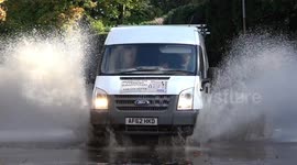 Crazy drivers plough through flooded roads in Stourbridge, West Midlands after torrential rain hit many parts of England