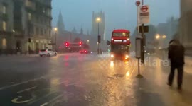 Sudden rain storm in Parliament Square