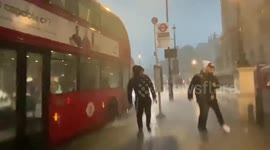 Sudden rain storm in Parliament Square