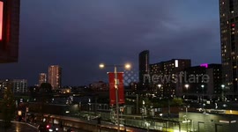 The heavy thunderstorm starts to clear over Stratford in East London