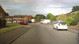 Woman drives on the wrong side of the road and is going head on into oncoming car.