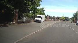 A squirrel runs out in front of the car but it's saved using a horn, few yards further is his dead friend