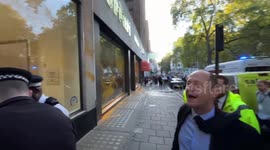 'This is desctructive': Member of public confronts climate activist over spray-painting car dealerships