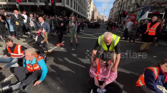 Angry drivers drag Just Stop Oil protesters out of road