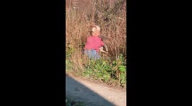 Little one year old trying to catch and play with her new cat