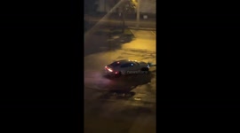 Car doing donuts crashes into poll after neighbour shouts.