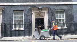 Cleaning outside 10 Downing Street