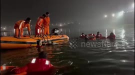 India's bridge collapse: Divers and rescuers search for survivors and victims in darkness