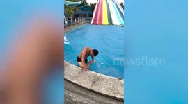 Tourist slams onto pool deck after plunging from giant waterslide in Thailand