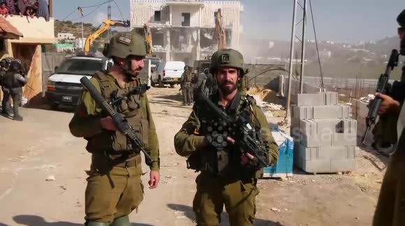 Israeli bulldozers demolish a three-storey Palestinian building - Buy ...