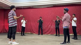 Palestinian youths from Hai group (a Live) perform contemporary dance moves on stage during rehearsal on the songs of the Palestinian singer Rim Bana
