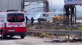 Palestinians take part in a demonstration at the Hawara checkpoint south of the city of Nablus