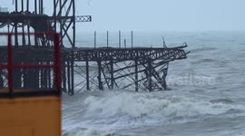 Part of Brighton's West Pier collapses during Storm Claudio in UK