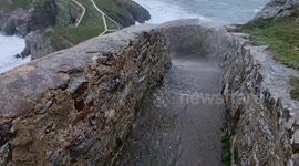 Storm Claudio turns cliff steps into a river as huge waves crash onto South Stack in Anglesey