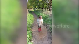 Three-year-old Peppa Pig fan is crowned the winner of the annual World Puddle Jumping Championships