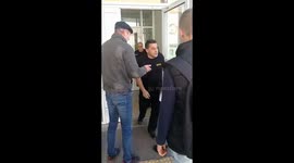 The guard doesn't let the student's mother into the school!