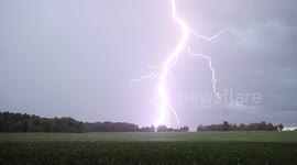 Spectacular lightning flash strike captured over a farmer's field in Ontario, Canada