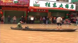 China rescue team offer help to people trapped in record floods