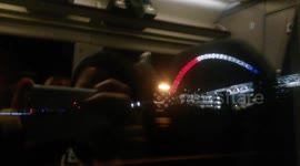 Wembley Stadium arch lit up in French flag colours