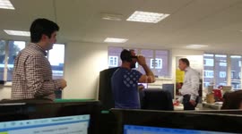 Hungover man tries out virtual reality headset