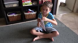 Sam opens up a package 2