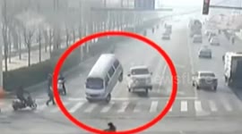 Cars seem to levitate in bizarre accident