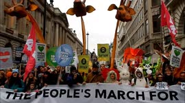 Thousands march in London ahead of Paris climate change summit