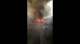 Flames and smoke from Newcastle shop fire