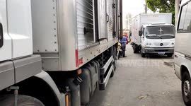 Truck drivers stuck due to intense traffic at CEAGESP in Sao Paulo, Brazil