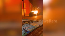 Firefighters attempt to put out car blaze believed to have been started by teens on Bonfire Night