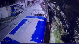 CCTV footage shows moment sidewalk collapses into creek in the Philippines
