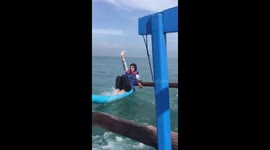 The girl suddenly fell into the water while riding a boat!