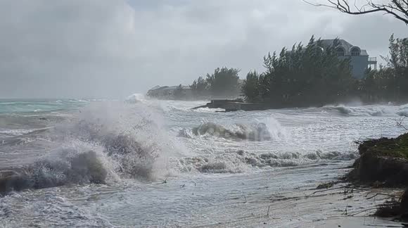 Raging waves as tropical storm Nicole batters Bahamas