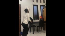 The man along with the cat ridiculously catch a lizard!