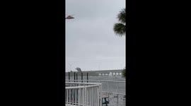 Coast Guard Rescuing people from wrecked sailboat in Indian River from Hurricane Nicole